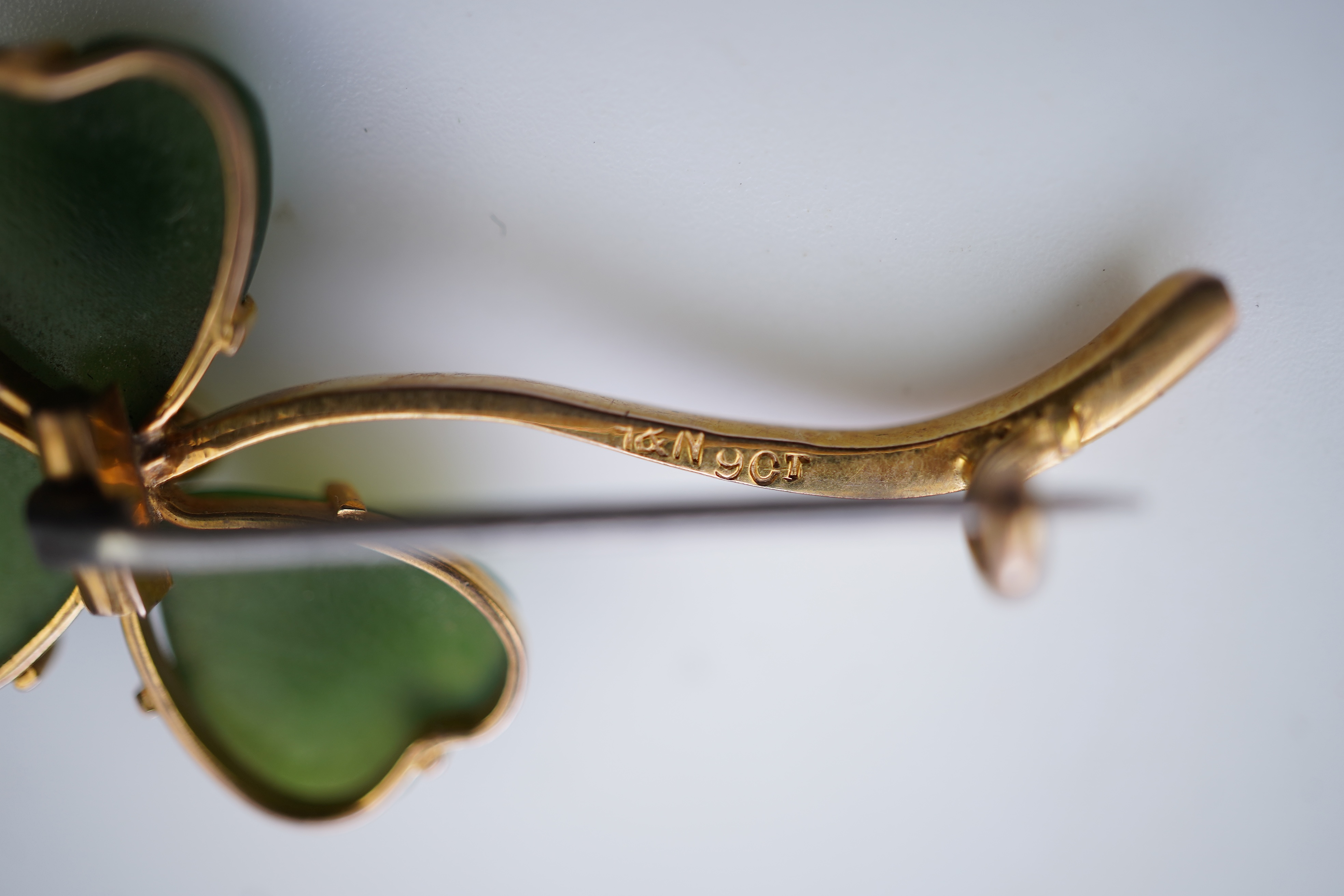 Two gem-set brooches